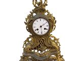 a clock that is sitting on top of a table