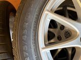 the wheels of a car are sitting on the floor next to each other