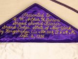 a purple and gold graduation cap with writing on it