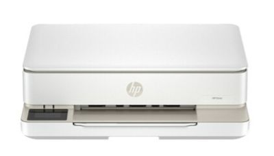 the hp desk printer is sitting on a white surface