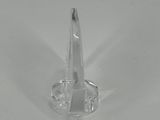 a close up of a clear cone shaped object on a white surface