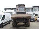 a large tractor that is parked in a parking lot