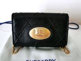 Portefeuille Burberry en cuir noir avec bandoulière à chaîne