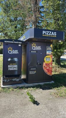 two vending machines that are on the side of the road
