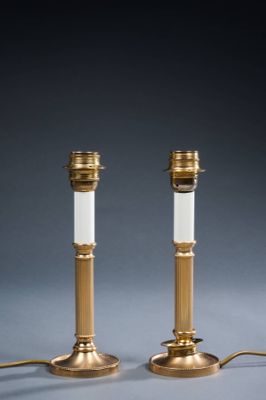 pair of brass table lamps with white glass shades