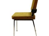 an image of a yellow chair with a black seat on a white background