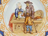 a plate with a picture of a man and a woman on it