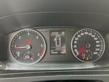 a close up of a car dashboard with various gauges