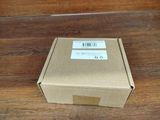 a box that is sitting on a wooden table