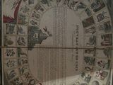 an old map on a table with a book on it
