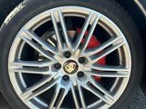 a close up of a tire on a black car