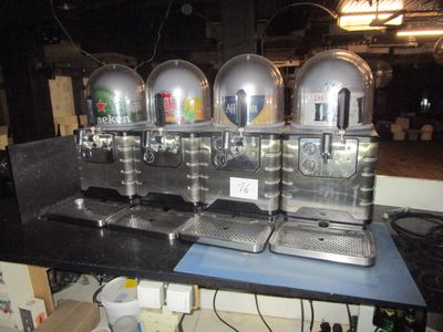three machines that are sitting on a counter