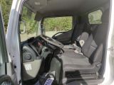 a picture of the inside of a truck with the driver ' s seat up