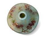 a picture of a vase with a flower design on it