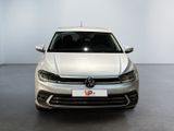 the front view of a silver volkswagen vw golf parked in a room