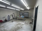 an image of a room with a lot of stuff on the floor