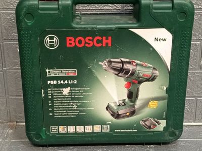 Perceuse visseuse à percussion BOSCH PSB 14. - Photo 1