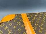 a close up view of a louis vuitton suitcase