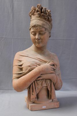 statue of a woman holding a baby in her arms
