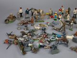 a lot of figurines that are on a table