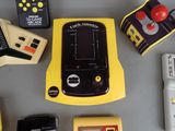 many different types of electronic toys on a table