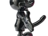 a black figurine of an elephant holding a baseball bat