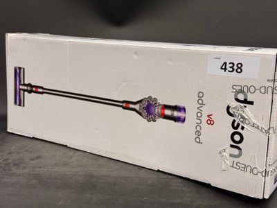 boxed box of a cordless vacuum cleaner on a table