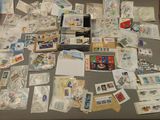 many cards and envelopes laid out on a table