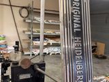 an image of a garage with a sign hanging from the ceiling