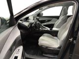 the interior of a car with the door open and the driver ' s seat down