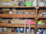 many boxes and boxes on the shelves in the room