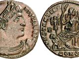 a coin with a woman on it and a man on the other side
