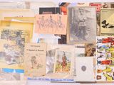 many different types of cards and postcards laid out on a table