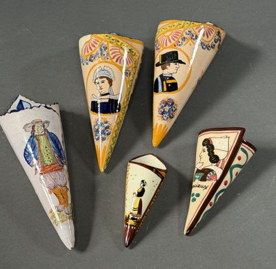 four different types of decorative cones on a gray surface