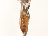 an image of a statue of a woman holding a sword