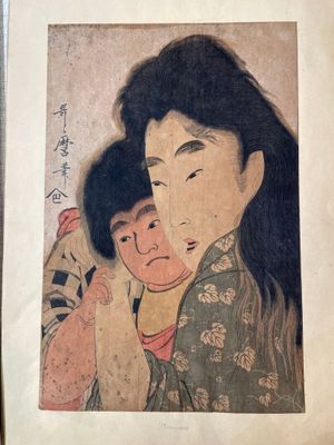 painting of a woman holding a child in her arms