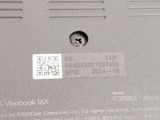 a close up of a laptop with a qr code on it