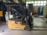 a forklift truck that is parked inside of a building
