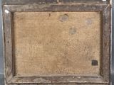an old picture frame with a picture of a cat in it