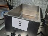 an image of a stainless steel pan with a number 3 on it