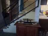 a table with a scale on it in the middle of a room