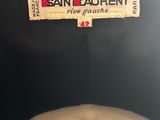 the label is on the back of a chair in a room
