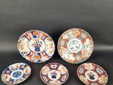 a set of five japanese imari porcelain bowls and saucers
