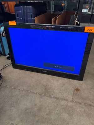 an image of a flat screen tv sitting on top of a floor