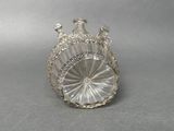 an image of a silver plate with a horse on it