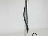 a close up of a lamp on a table with a white background