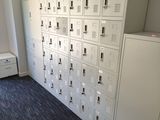 a room with a bunch of lockers in it