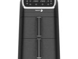 a black and silver air fryer on a white background