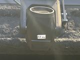 a machine that is sitting on the side of a building