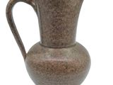 a brown vase with a handle on a white background